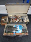 An early twentieth century trunk with lift out tray containing model railway accessories including