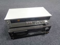 A Technics M216 stereo cassette deck together with a Technics RS-BX404 stereo cassette deck