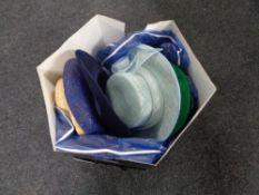 A hat box containing five lady's hats