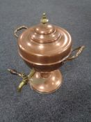An antique copper and brass samovar