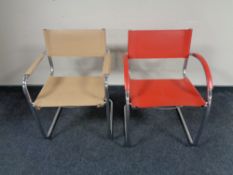 Two contemporary leather upholstered tubular metal chairs