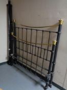 A Victorian style cast iron and brass 4'6 bed frame