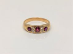 A ruby and diamond set ring, size O CONDITION REPORT: Apparently unmarked.