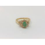 An 18ct gold emerald dress ring, size K CONDITION REPORT: 3.