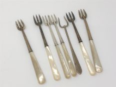 Six silver pickle forks with mother of pearl handles,