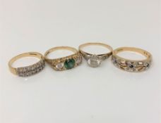 Four various gold gem set rings CONDITION REPORT: 9.