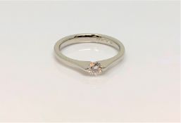 A platinum solitaire diamond ring, approx. 0.