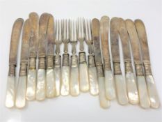 Sixteen mother of pearl handled EPNS knives and forks