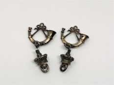 Two Victorian cast silver bugles and two similar crowns CONDITION REPORT: 48g