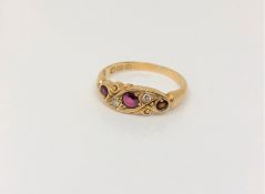 An antique 18ct gold ruby and diamond ring, size L CONDITION REPORT: 2.