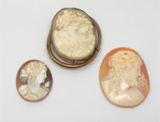 An antique cameo brooch (requires attention) and two other cameos