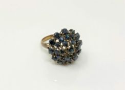 A 14ct gold sapphire cluster ring (one stone deficient),