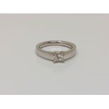 An 18ct white gold princess cut solitaire diamond ring, approximately 0.