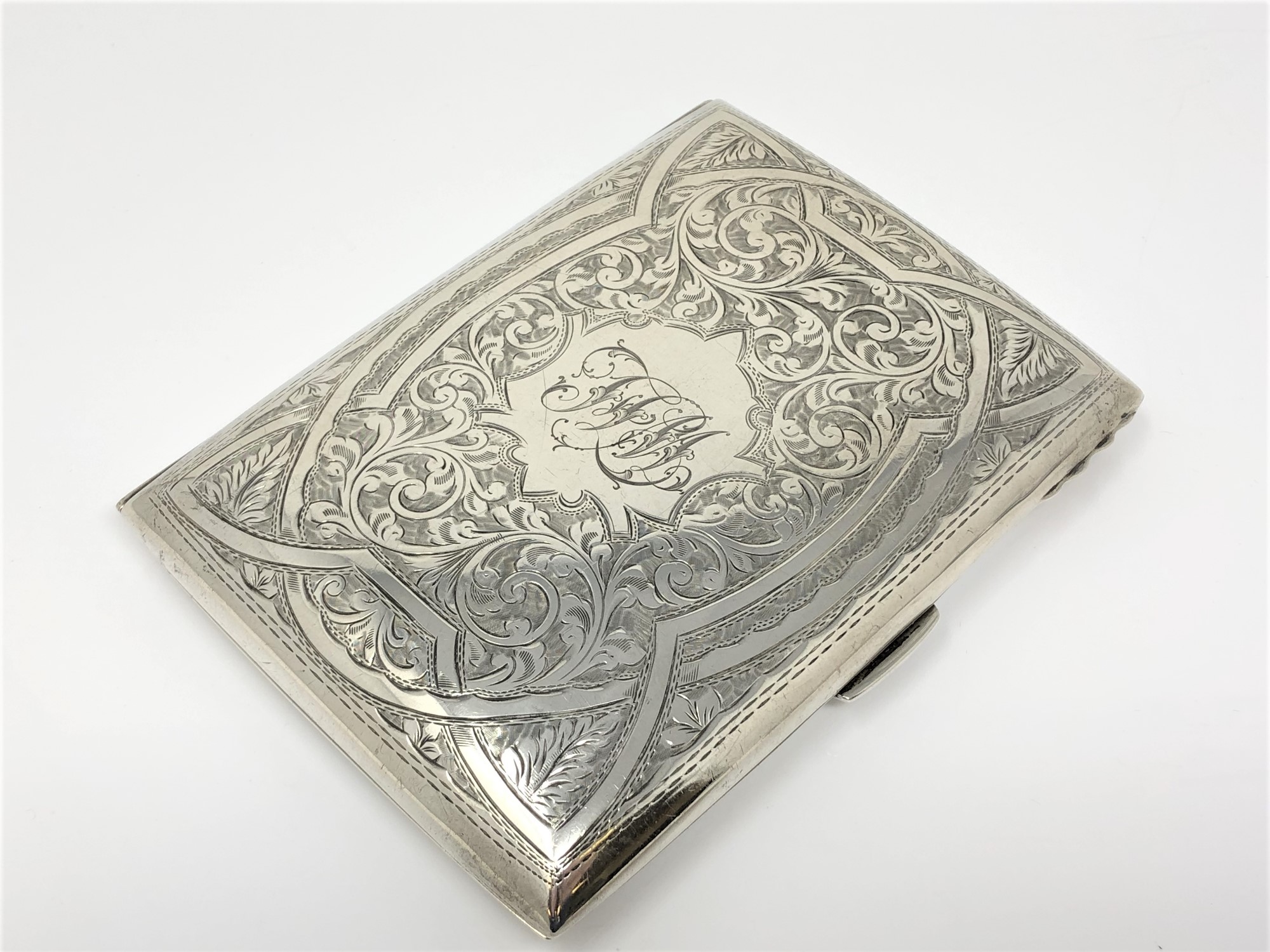 A large silver cigarette case,