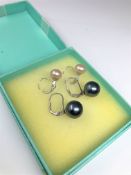 A pair of 14ct white gold pearl earrings,