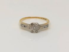 An 18ct gold diamond cluster ring, size M CONDITION REPORT: 2.