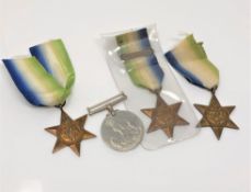 Three WWII Atlantic Stars with ribbons,