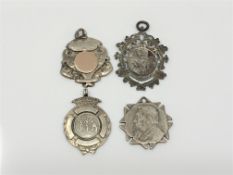 Four antique silver watch fobs