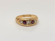 An antique 18ct gold ruby and diamond ring, size M CONDITION REPORT: 4.