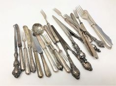 A large quantity of silver handled items (approx.