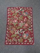 A Kashmiri hand stitched wool chain rug 88 cm x 60 cm