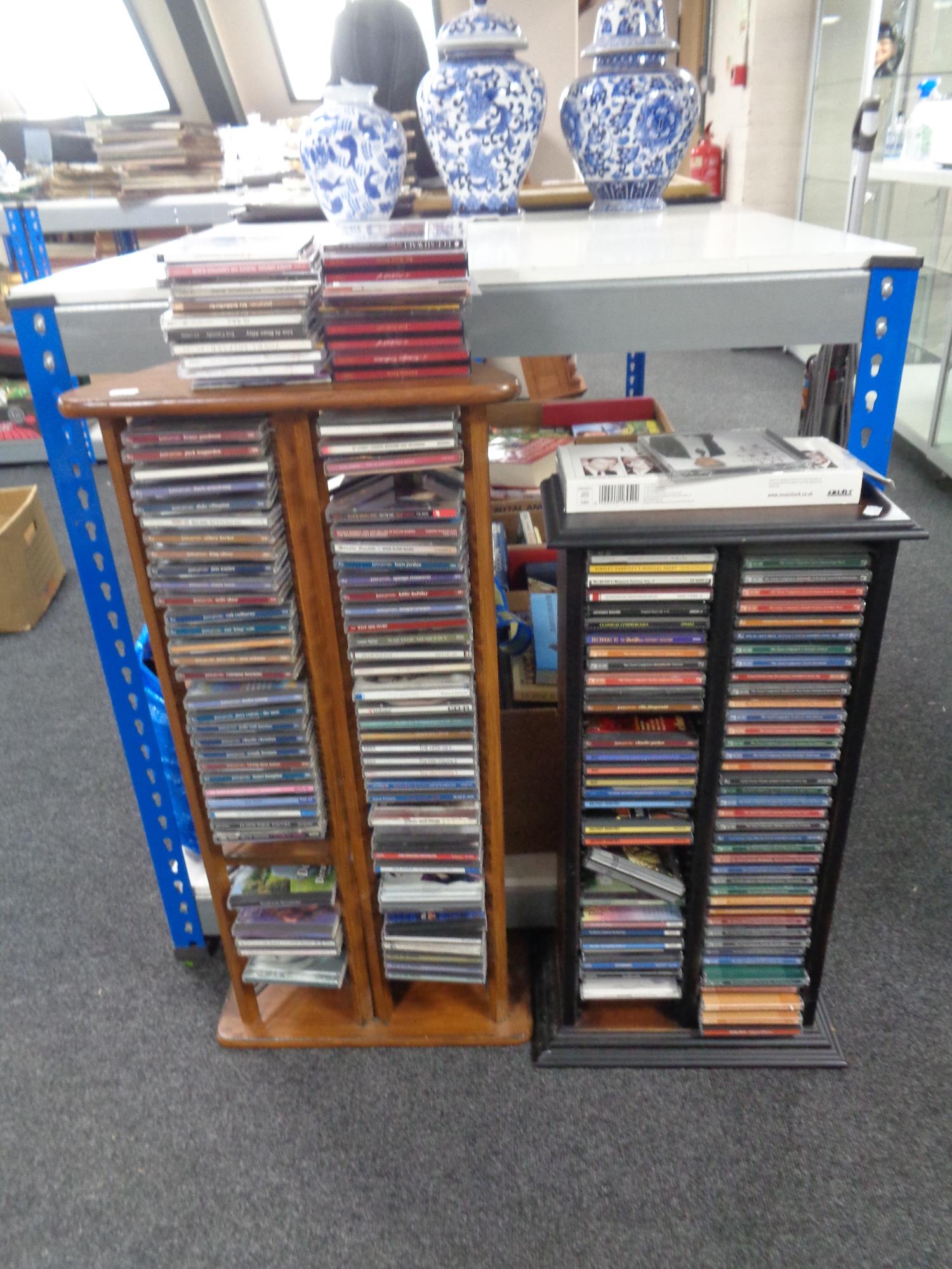 Two CD racks containing assorted CDs to include the Great Composer collection, Legendary Crooners,