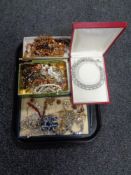 A tray containing fashion jewellery including beaded necklaces, brooches, earrings etc.