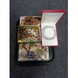 A tray containing fashion jewellery including beaded necklaces, brooches, earrings etc.