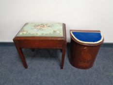 An Edwardian mahogany tapestry upholstered storage piano stool,