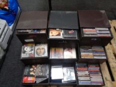 Four contemporary leather storage chests containing large quantity of CDs,