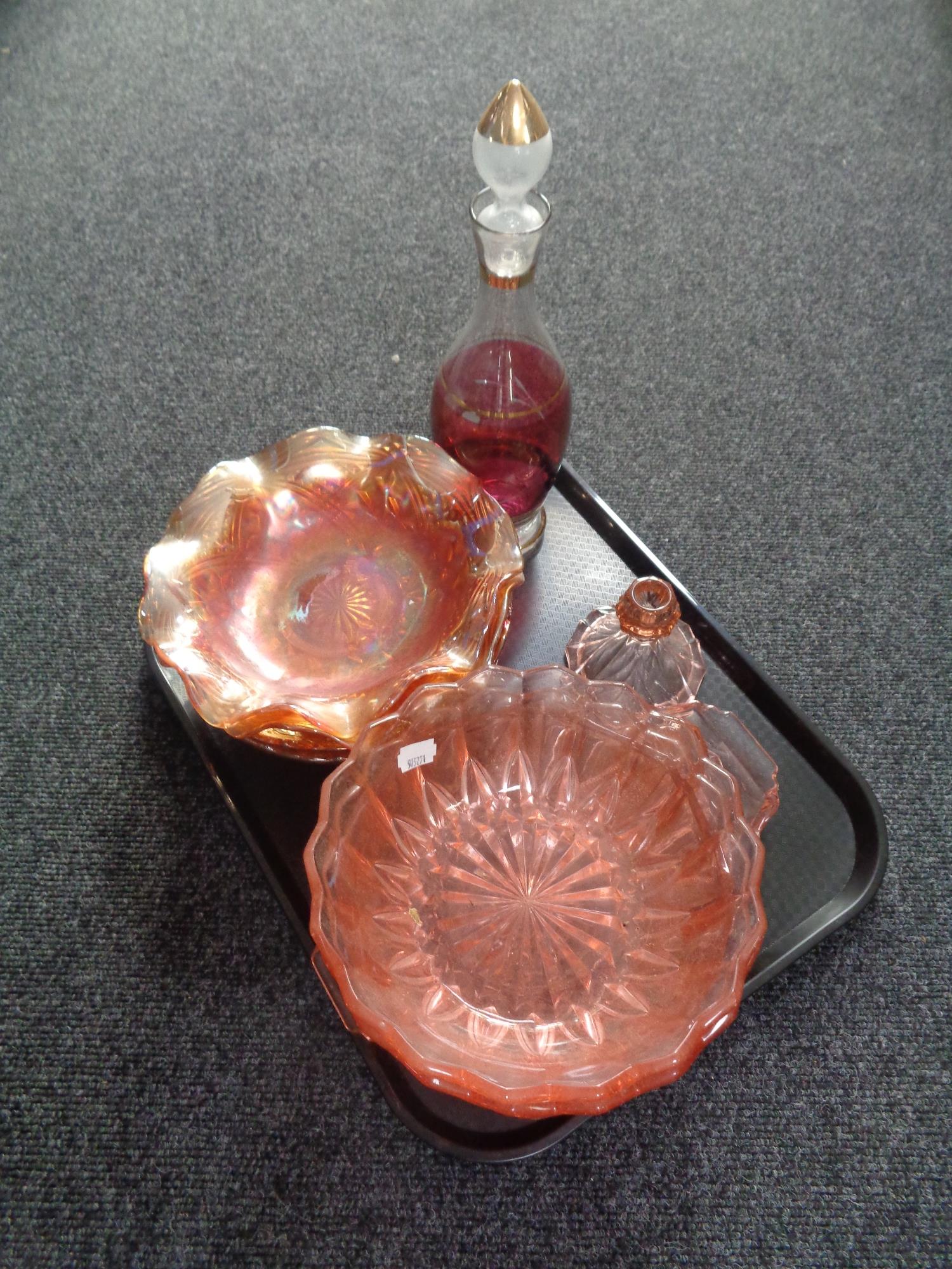 A tray containing twentieth century glassware to include pink Art Deco glass trinket set and bowls,