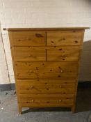 An Ikea pine seven drawer chest