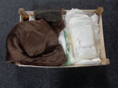 A box of assorted table linens,