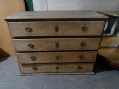 A continental oak 19th century four drawer chest (a/f)