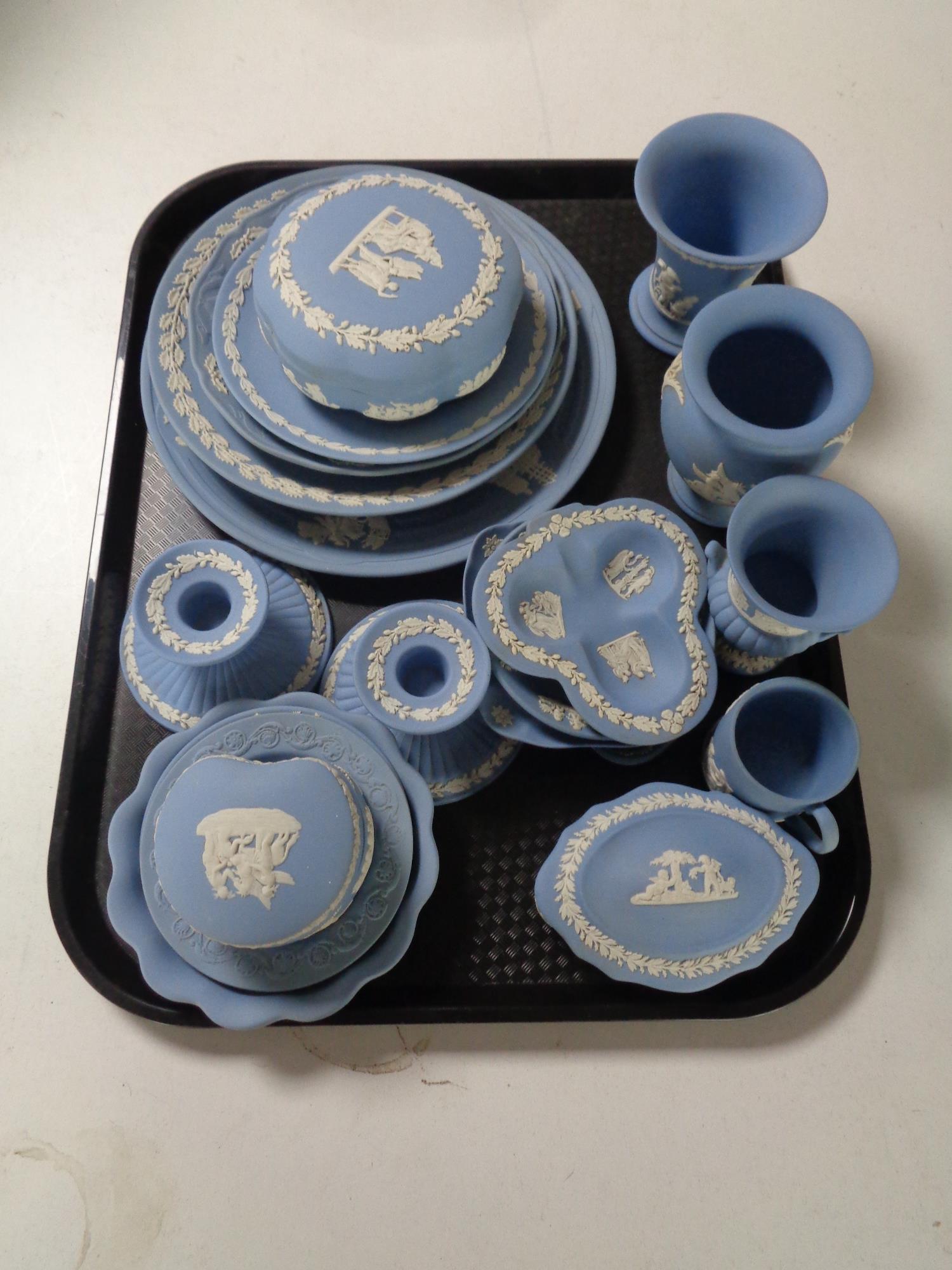 A tray containing 19 pieces of Wedgwood blue and white Jasperware