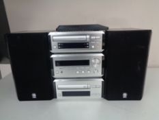 A three piece Yamaha Hi-Fi separates system with speakers,