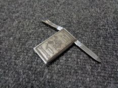 A Masonic clip with folding pocket knife and nail file combined,