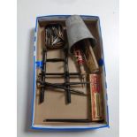 A box containing antique fountain pens, a pen stand with boxer dog head mounts,