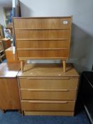 A mid 20th century teak four drawer chest together with similar three drawer chest