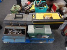 Three plastic and one metal tool box containing assorted hand tools and hardware