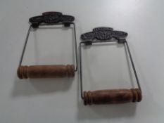 Two reproduction railway toilet roll holders