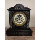 An Edwardian black slate mantle clock