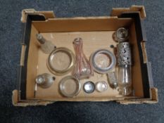 A box of various silver topped items