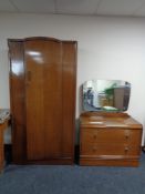A twentieth century oak single door wardrobe with matching two drawer chest