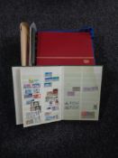 A basket containing assorted stamp albums and loose stamps, stamps of the world,