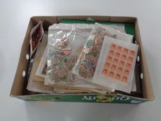 A box containing album of Malaya and Great Britain stamps together with a large quantity of loose