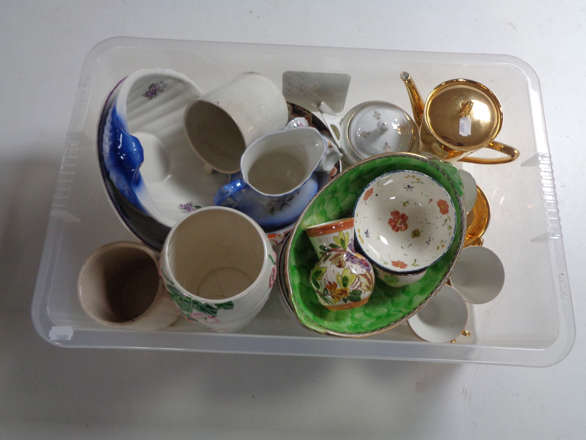 A crate containing miscellaneous china to include Maling vase and bowl, a Wedgwood dessert set,