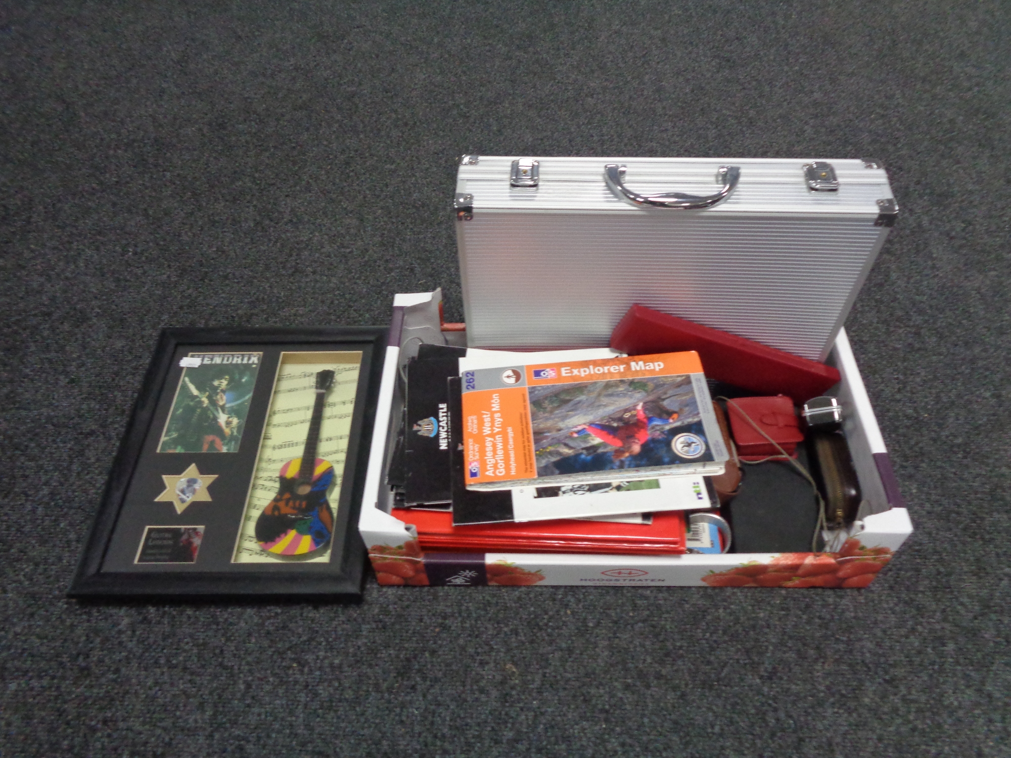 A box containing early 21st century Newcastle United programmes, Broons annuals,