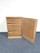 An antique pine printer's cabinet fitted trays