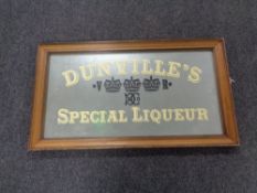 A framed mirror bearing Dunville's Special Liqueur advertisement